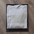 FOG Essentials 1977 "Light Oatmeal" Hoodie